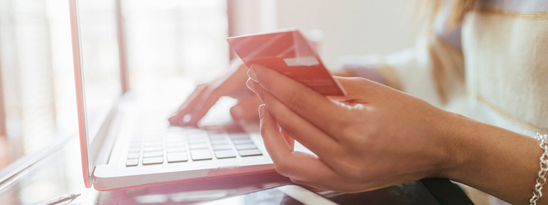 Woman, laptop and card